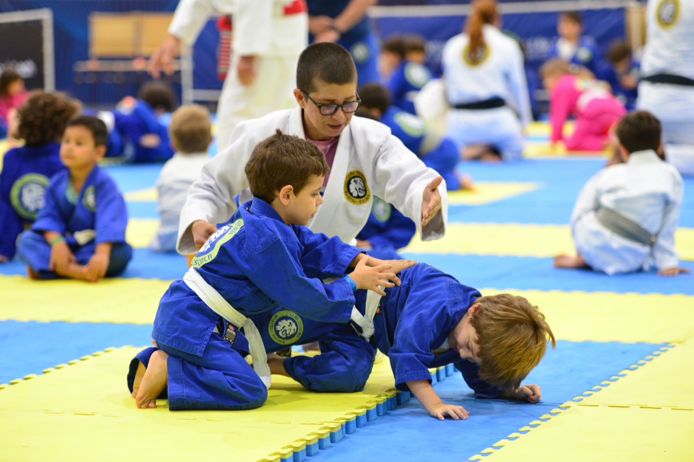 Kids warming up at the start of class